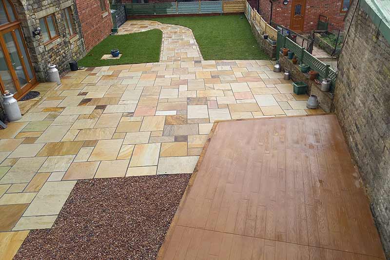 Wood effect pattern imprinted concrete decking in Rochdale by J&J Groundworks.